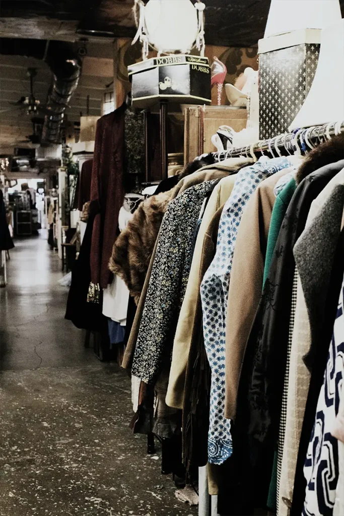 Closeup interior look of a clothing thrift shop in a suburban area of the city